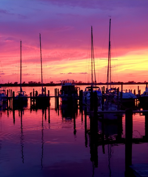 Sunset with Anchored Boats in Background