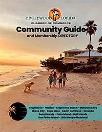 Cover of the Englewood Chamber of Commerce Community Guide and Membership Directory, in background a group of kids walking on the beach